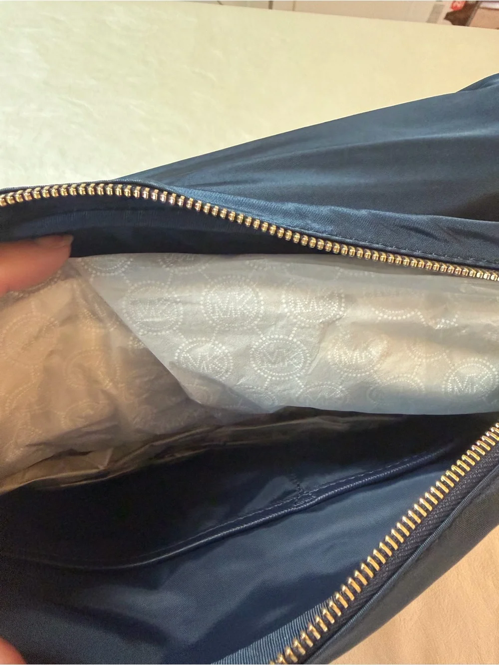 Michael Kors Navy Messenger Bag with Gold Logo